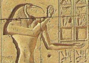 El dios Thoth en un grabado sobre la pared de un templo